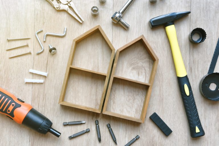 House building and maintenance, DIY and construction tools on wooden background
